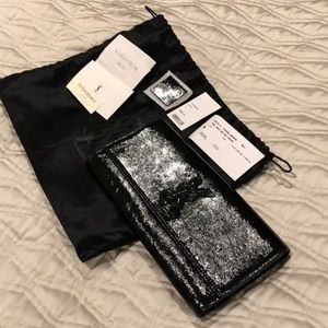 Yves Saint Laurent Belle du Jour Clutch Black